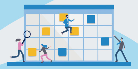 Business people navigating a large calendar grid