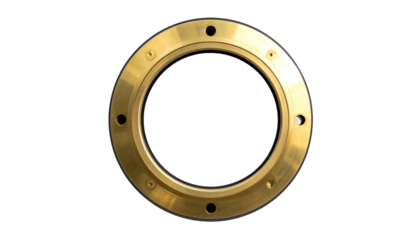 A circular, gold-colored metal ring with evenly spaced screw holes on black