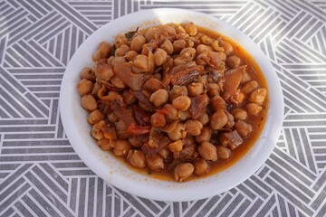 Chickpeas with onions dish, a traditional Greek dish, served in a restaurant