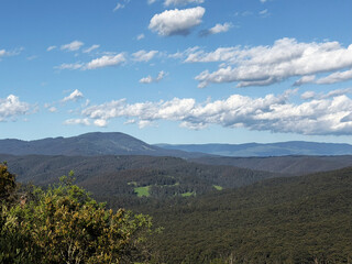 Mountain range forest and weather clouds