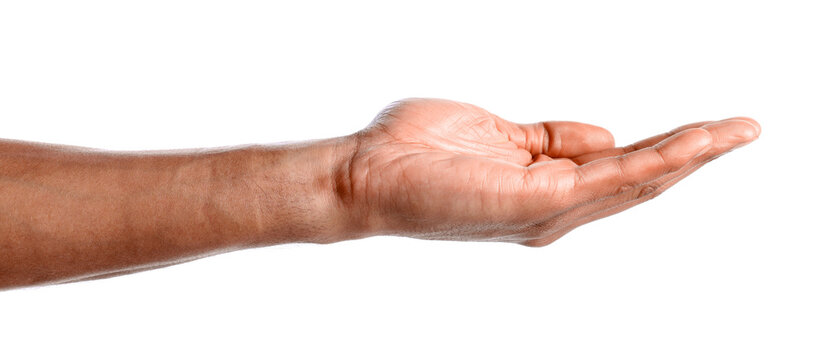 African-american man holding something on white background, closeup - Powered by Adobe