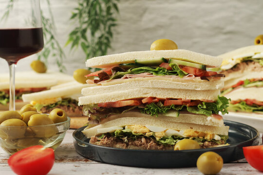 Different Italian tramezzini sandwich in tradition triangle form	