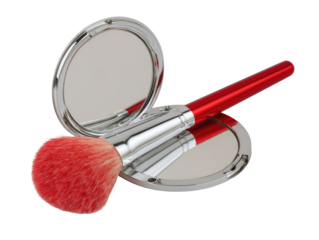 Makeup brush resting on compact mirror, red handle, light bristles