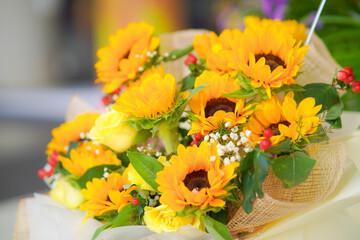 A beautifully arranged sunflower bouquet shines with bright golden blooms and fresh, cheerful charm.