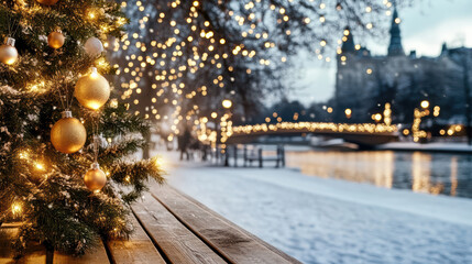 Festive golden bauble Christmas tree with lights by snowy river promenade, cozy evening glow