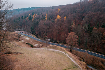 The beautiful Prądnik Valley. A winding road and river.The Krak&oacute;w-Częstochowa Upland. Poland. Autumn. Ojc&oacute;w National Park. Sułoszowa. A winding road