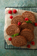 Dark chocolate swiss roll with raspberry