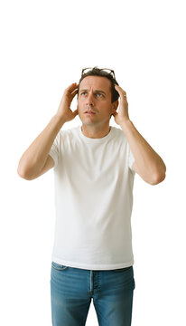 A man looking for glasses that are on his head