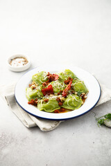 Spinach ravioli with sun dried tomatoes