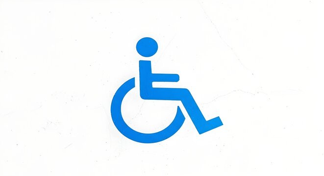 Blue wheelchair accessibility symbol painted on a white wall, representing disability access and inclusive facilities