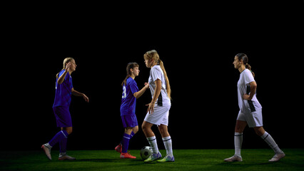 Fototapeta premium Young soccer players coordinating midfield play during possession. Concept of tactical instruction, controlled buildup teaching, coaching diagrams, structured sports lessons.
