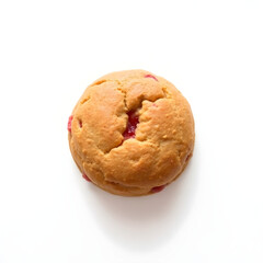 A freshly baked brown strawberry biscuit with a slightly placed on a clean and simple white background