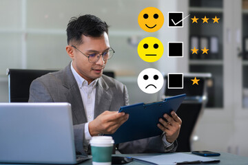 Male businessman holding a digital tablet with checkboxes rating smiley faces excellent for Satisfaction Survey, Happy Client Customer Experience concept.