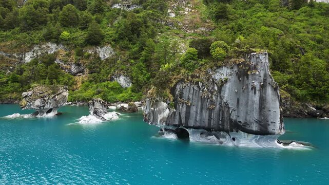 Aerial drone view of the famous marble caves of Patagonia, carved by centuries of water erosion