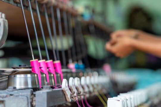 Thread spinning in old textile factory traditional machine operation with yarn production process by Handmade textile and fiber industry equipment fibers manufacturing silk industrial sewing fabric