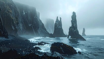 Moody coastal view with dark cliffs and dramatic sea stacks shrouded in fog on a dark beach with crashing waves