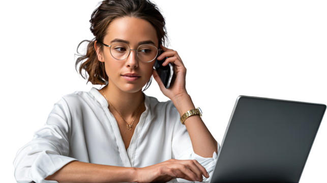 Focused Professional on the Phone: A concentrated businesswoman is engaged in a phone call, skillfully managing her laptop while looking composed, in a bright office environment.
