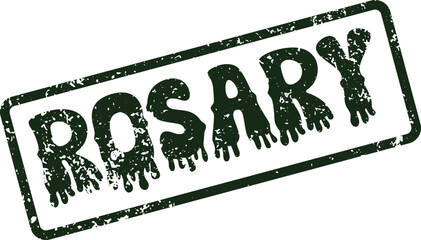 Distressed green rubber stamp bearing the devotional word Rosary on a clear surface for religious communication