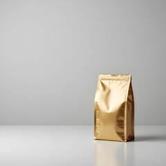 Premium gold foil coffee bag standing on white surface, luxury bean packaging mockup