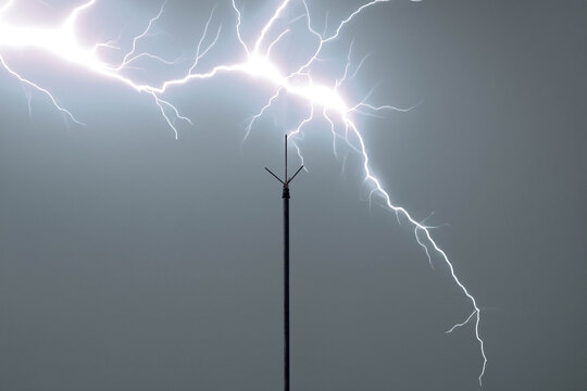 Dramatic Lightning Strike on a Stormy Night with a Lightning Rod