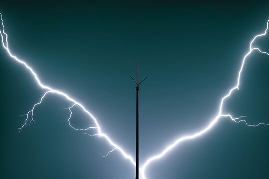 Dramatic Lightning Strike on a Stormy Night with a Lightning Rod