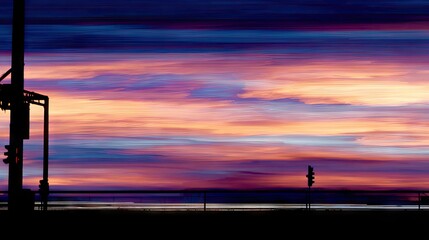 Colorful sunset over a city skyline.