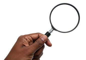 Close-up of a dark-skinned hand holding a magnifying glass on a white background with copy space concept of research and discovery