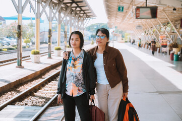 A backpacking tourist girl at the train station