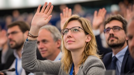 Voting Session in European Parliament With Members Raising Hands for Decision Making in Policy Matters