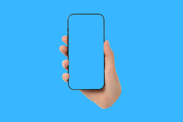 A hand holds a smartphone with a blank screen on a blue backdrop
