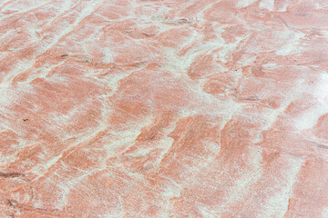 Fototapeta premium Sandwood Bay Beach, Scotland. Soft pink sand dunes textured surface — abstract desert background for design and stock use