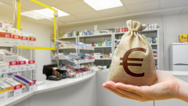 Euro money bag on the background of a pharmacy with medical supplies. Concept of cost of medicines and medical financing