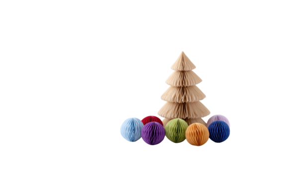 Festive Crafts: An artisanal creation of a paper Christmas tree and decorative paper balls on display, showcasing a handmade holiday decoration, celebrating seasonal joy.