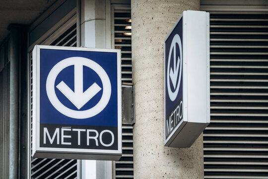 Montreal, Canada - August 13, 2025: official blue sign for entrance to Montreal Metro, downtown transit
