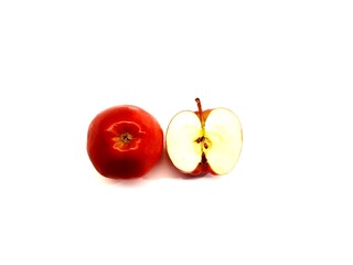 Fresh red apple and half apple on white background. Autumn seasonal fruit rich in vitamins, symbol of healthy lifestyle, natural nutrition, organic diet, and clean eating concept.