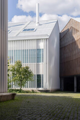 Skolkovo Institute of Science and Technology. Minimalist modern architectural vertical aluminum slats. Contemporary architecture in Skolkovo, Moscow, Russia. Public space improvements. 