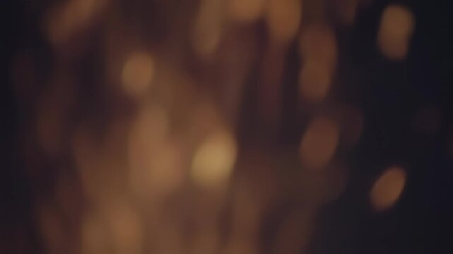 Abstract Warm Bokeh Background with Glowing Particles