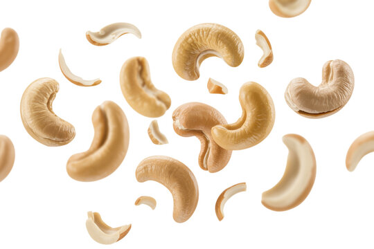 Delicious whole and broken cashew nuts in motion, healthy food