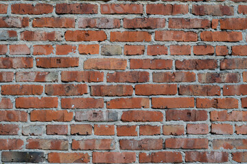 Fototapeta premium Old red brick wall texture with rough mortar