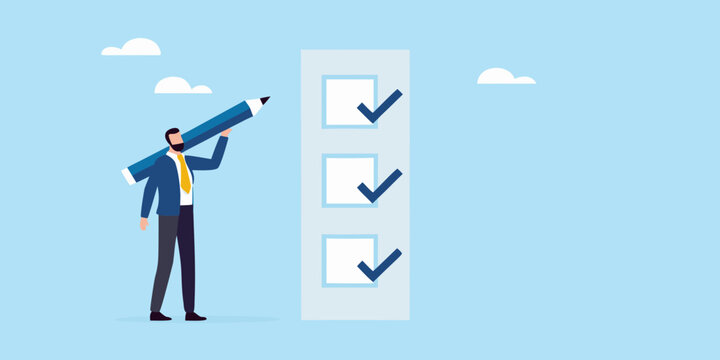 Businessman completing a checklist with a giant pencil