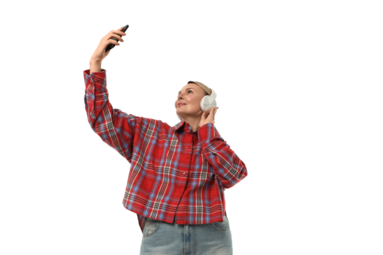 Person enjoying music and capturing a selfie, isolated on white, PNG