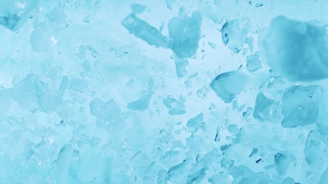 Super Slow Motion of Exploding Ice Shards . Filmed on High Speed Cinema Camera at 1000 FPS