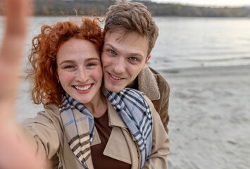 portrait of a young couple doing selfie