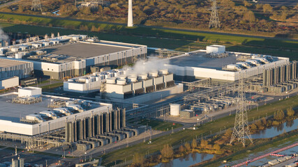 Naklejka premium Aerial Vertical View: Massive Data Center Cooling Systems.