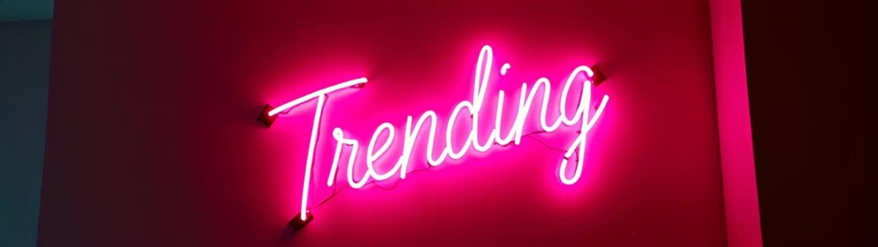 Neon sign of trending neon sign in a pink room