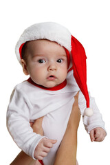 Cute baby wearing a Santa Claus hat