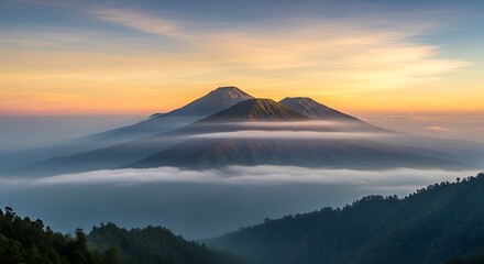 Majestic Mountain Peaks Emerging from a Sea of Clouds at Dawn