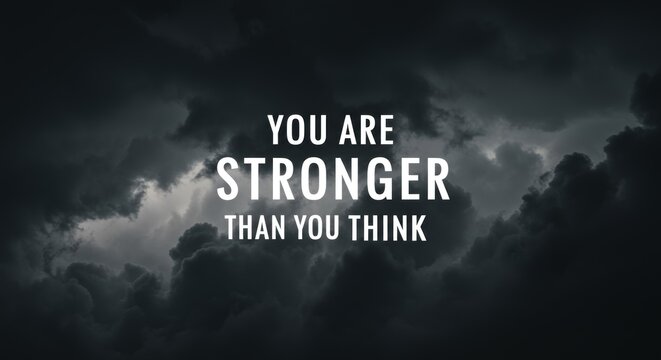 Motivational strength text over stormy clouds