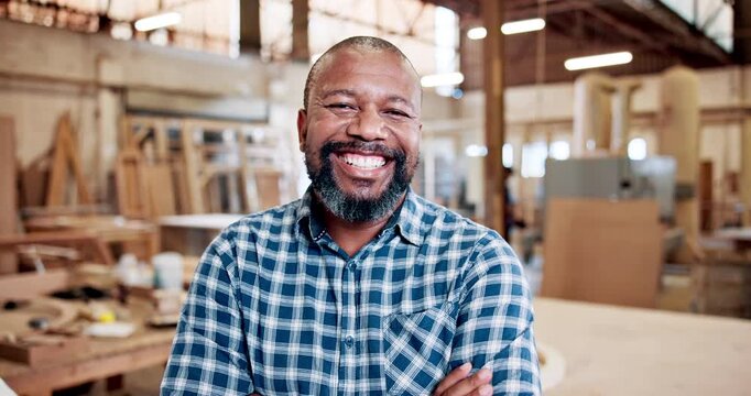 Face, smile and man with arms crossed, carpentry and furniture industry with career ambition. Entrepreneur, person and professional in workplace, artisan wood and timber service with skills and pride
