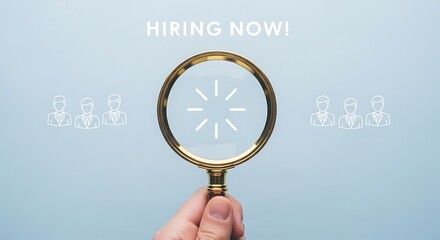Hand holding magnifying glass over loading icon for hiring now concept